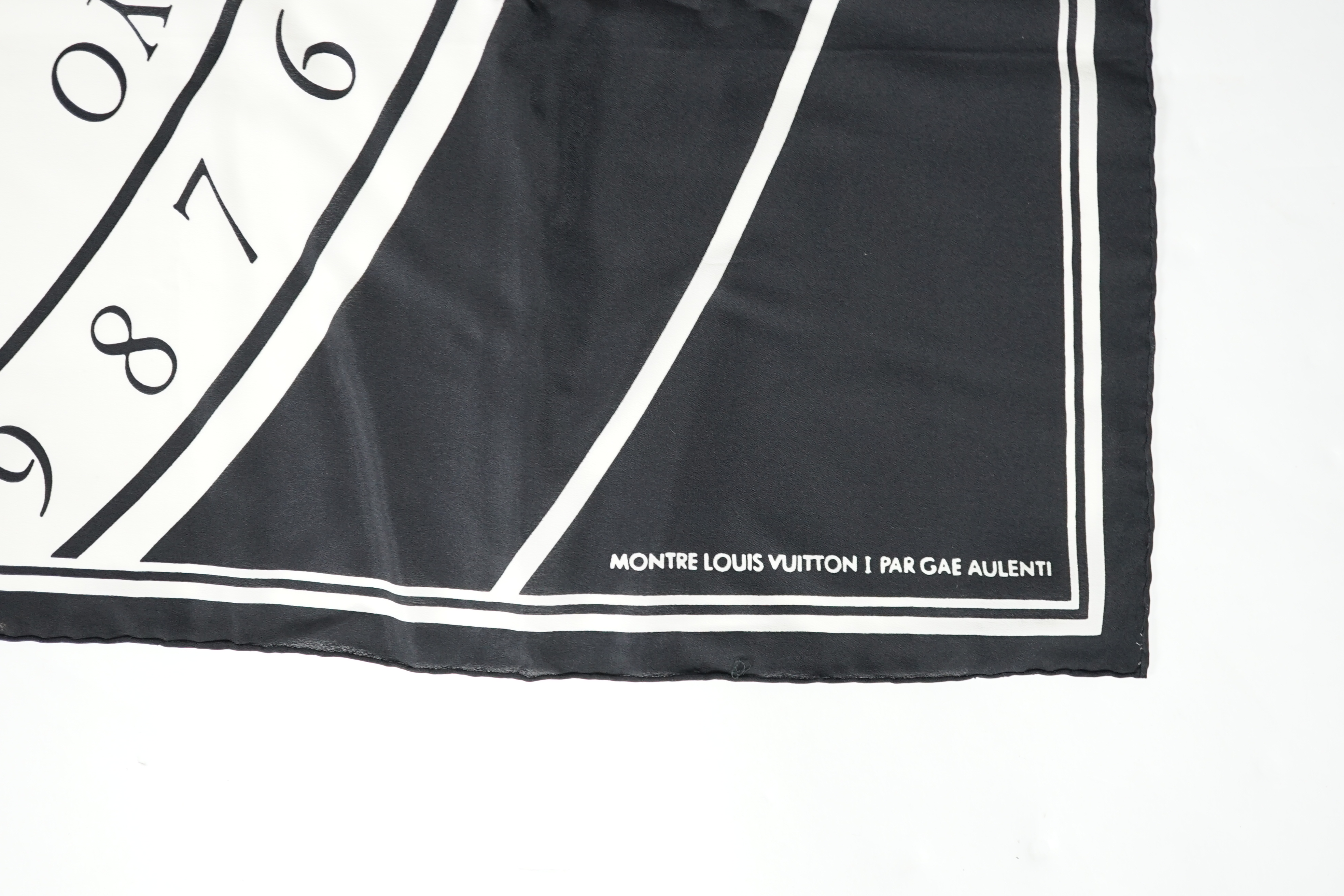 A Louis Vuitton, Cartier and Pucci boxed scarves